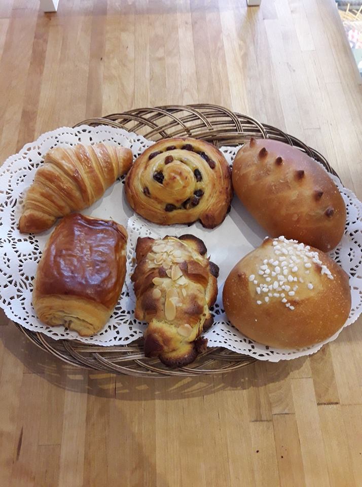 A basket of fresh croissants, pain au chocolat and pastries from The Wee Boulangerie